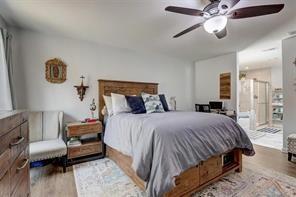 170 Greenbrier Way Canton, GA 30114 - Photo 17 of 34 a bedroom with a bed and a chandelier
