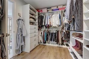 170 Greenbrier Way Canton, GA 30114 - Photo 21 of 34 a view of walk in closet with clothes