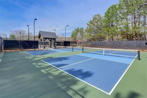 170 Greenbrier Way Canton, GA 30114 - Photo 32 of 34 a view of a tennis ground with large trees