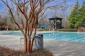 170 Greenbrier Way Canton, GA 30114 - Photo 33 of 34 a view of backyard with wooden fence and large trees