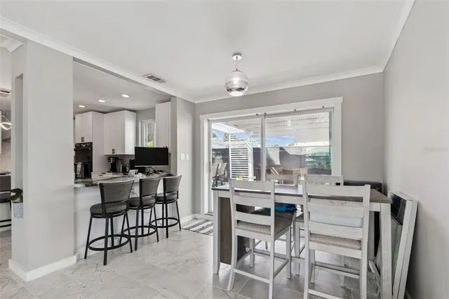 a view of a livingroom with furniture and windows