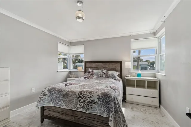 a view of a backyard with sitting area