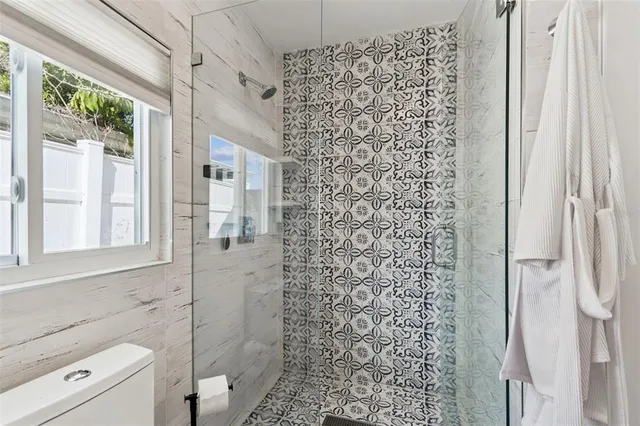 an aerial view of a house with a garden