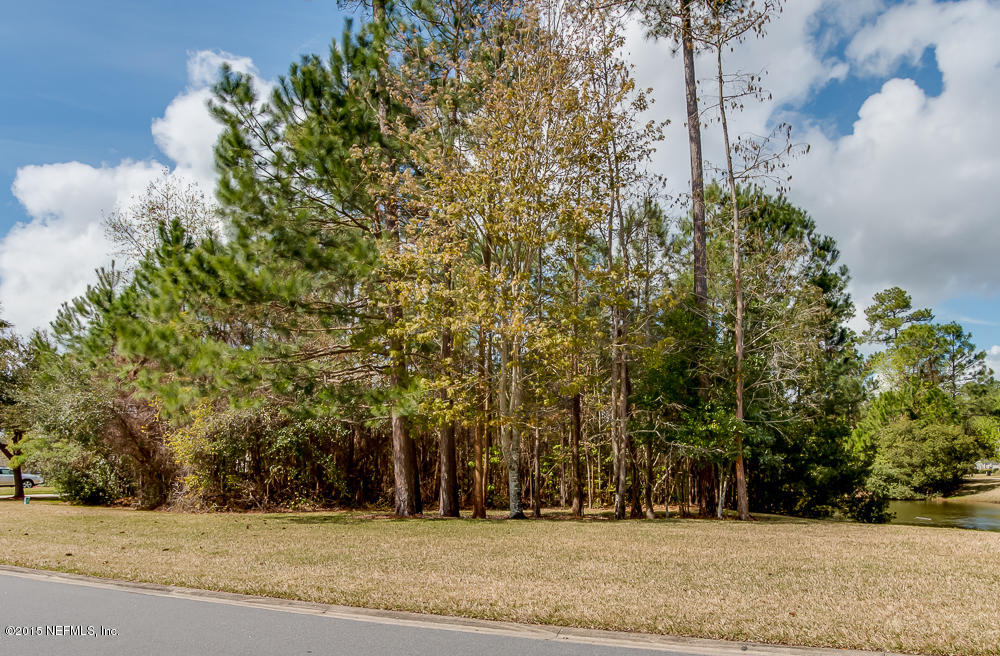 1112 Sandlake Road St. Augustine, FL 32092 - Photo 12 of 16 a view of a house with a tree