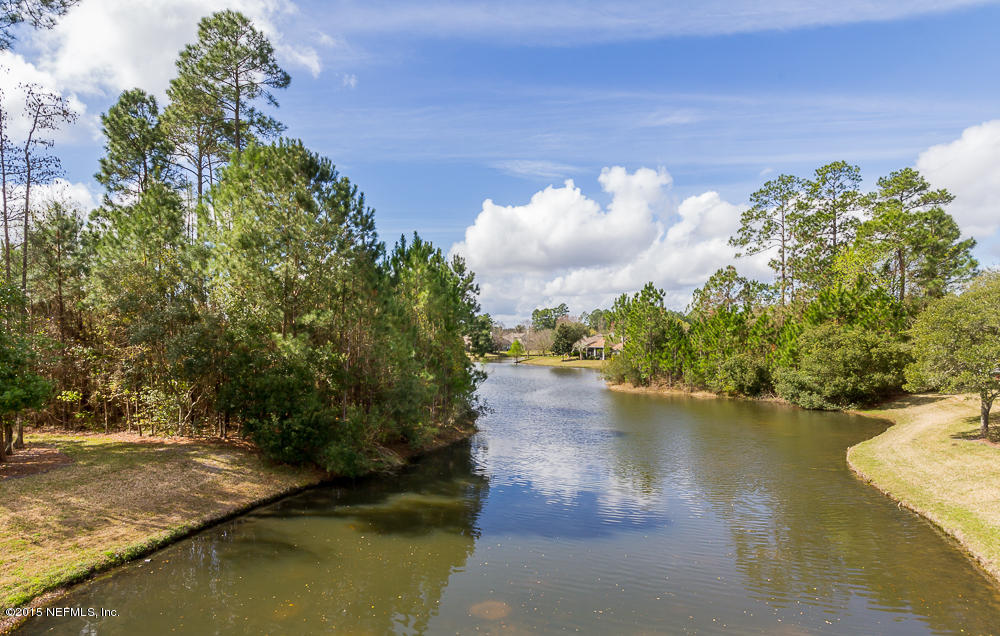 1112 Sandlake Road St. Augustine, FL 32092 - Photo 2 of 16 a view of a lake with outdoor space