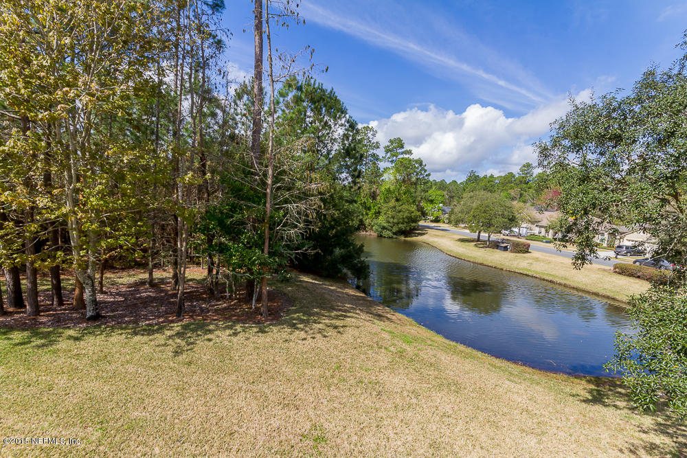 1112 Sandlake Road St. Augustine, FL 32092 - Photo 6 of 16 a view of a backyard with swimming pool
