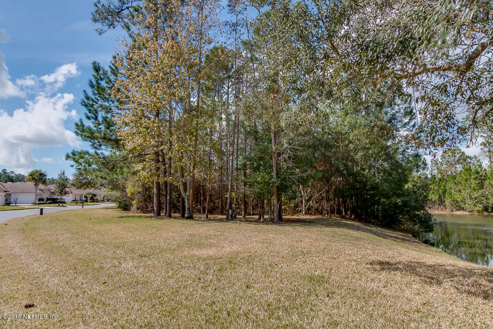 1112 Sandlake Road St. Augustine, FL 32092 - Photo 10 of 16 a view of outdoor space with trees