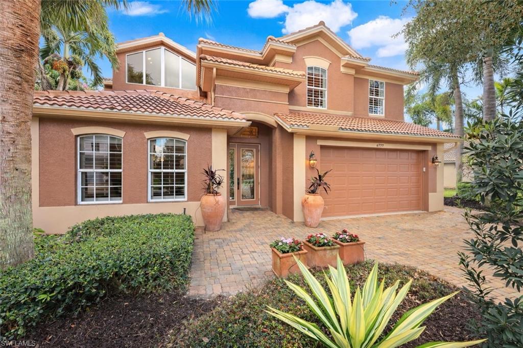 6777 Southern Oak Court Naples, FL 34109 - Photo 3 of 49 Beyond this door are a few surprises we can't wait to show you!