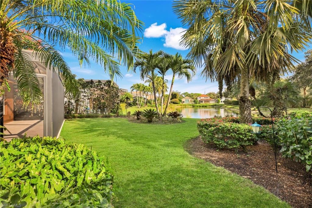 6777 Southern Oak Court Naples, FL 34109 - Photo 37 of 49 A tropical Oasis, with thoughtful landscaping to enhance the stunning lake view