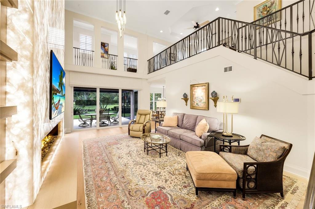 6777 Southern Oak Court Naples, FL 34109 - Photo 5 of 49 A Great room that truly lives up to the name