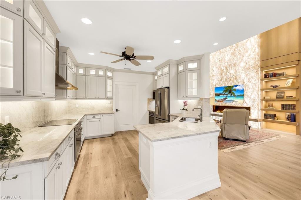 6777 Southern Oak Court Naples, FL 34109 - Photo 7 of 49 A chef's Kitchen with a timeless design