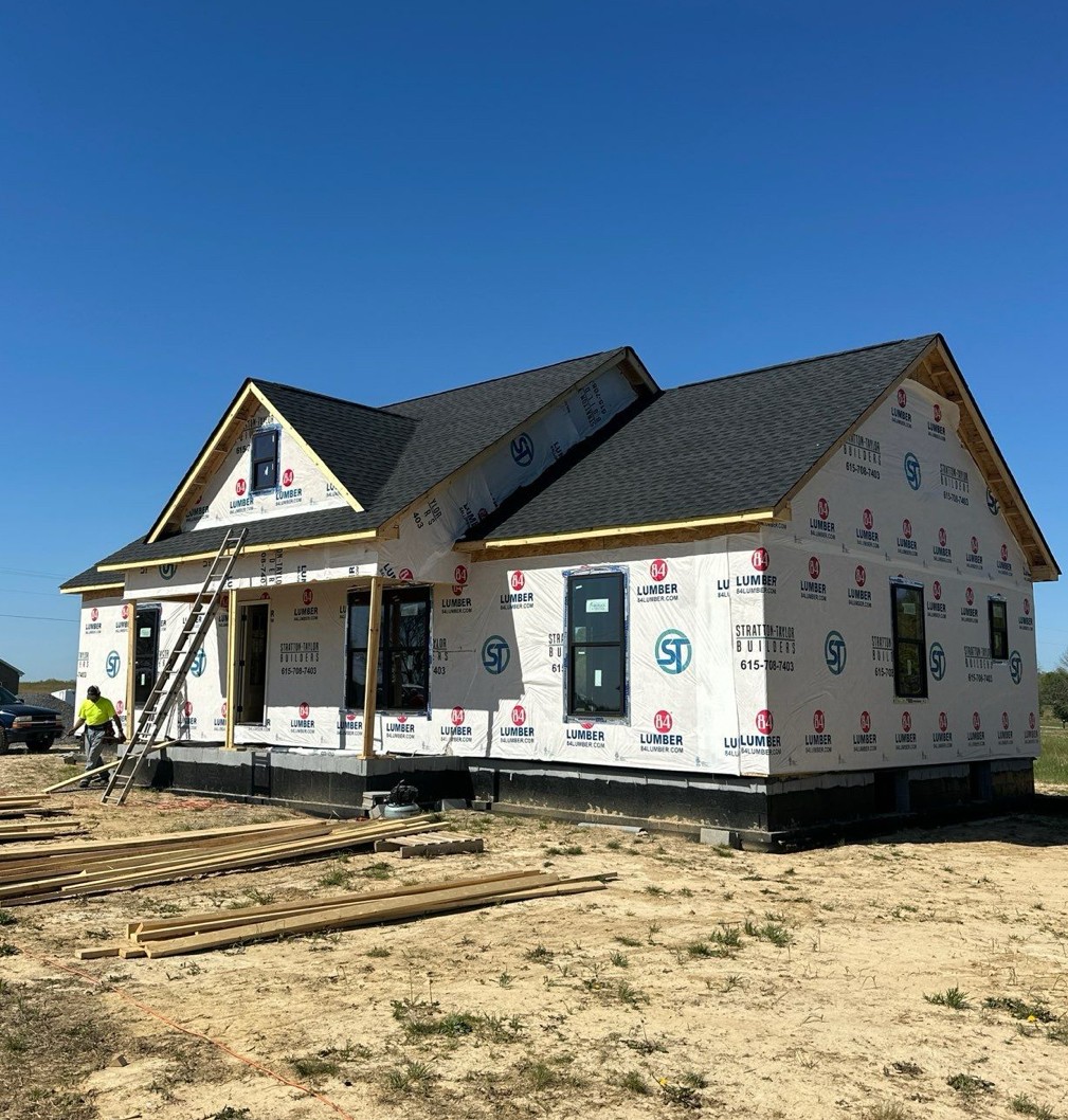 109 Fleming Road Portland, TN 37148 - Photo 1 of 1 a view of a house with large windows and a white roof