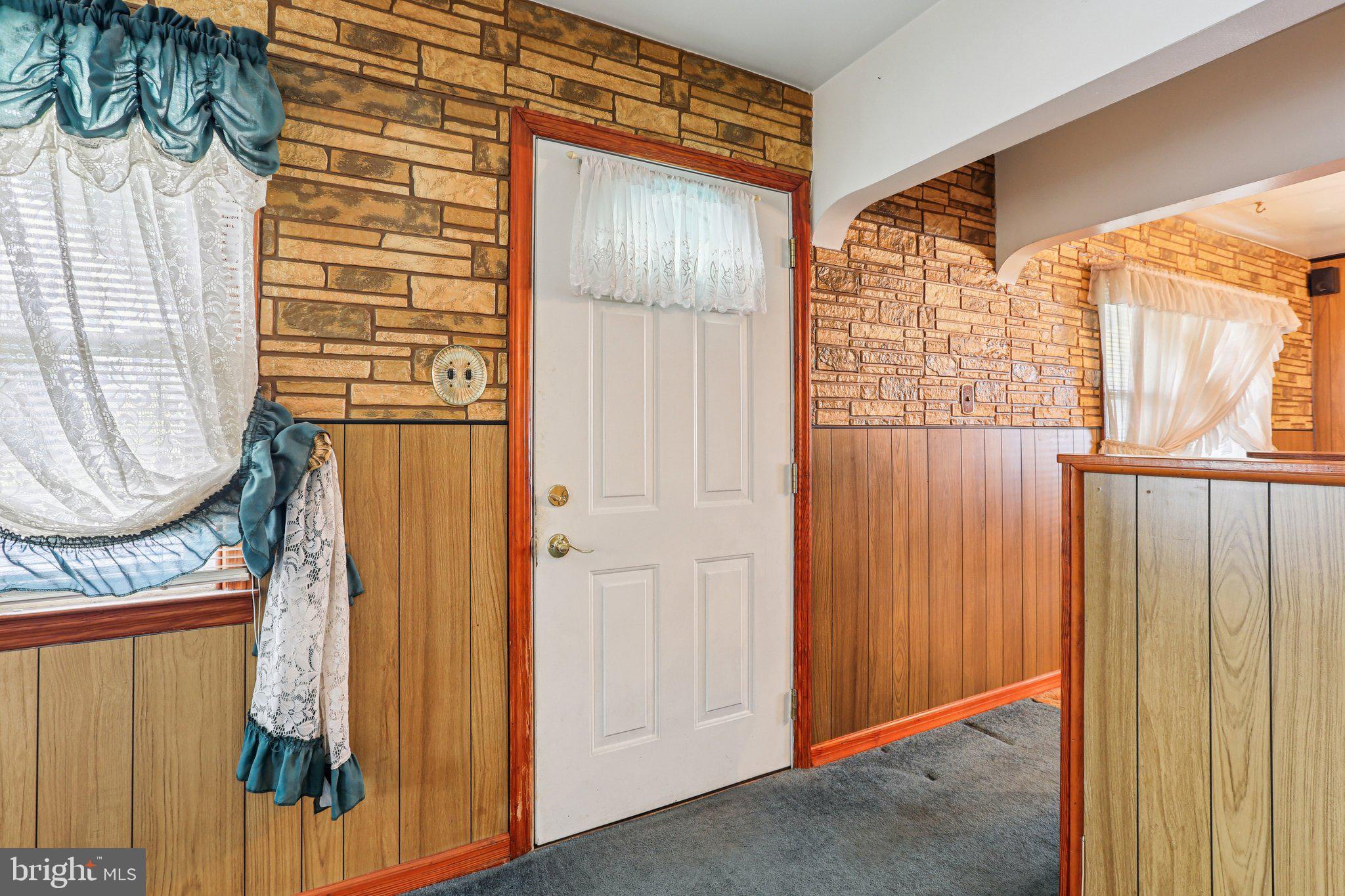 316 Holy Cross Road Brooklyn, MD 21225 - Photo 4 of 32 a view of a entryway door