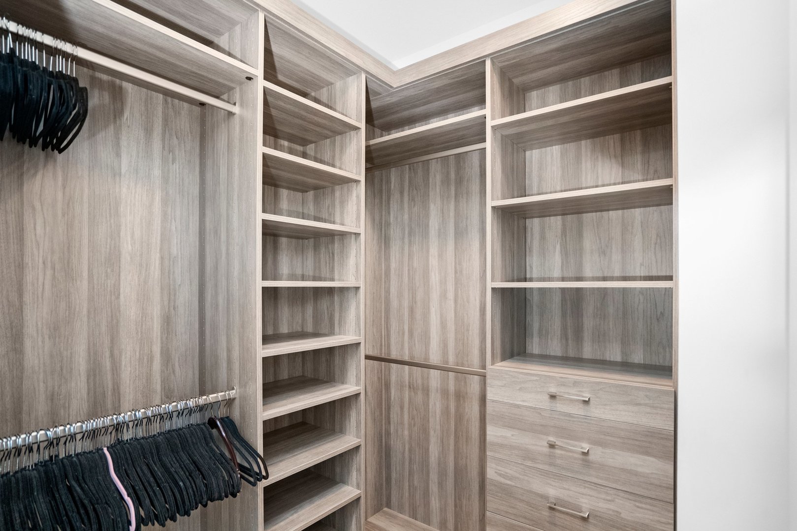 360 West Erie Street, Unit 5A Chicago, IL 60654 - Photo 14 of 32 a view of walk in closet with empty racks