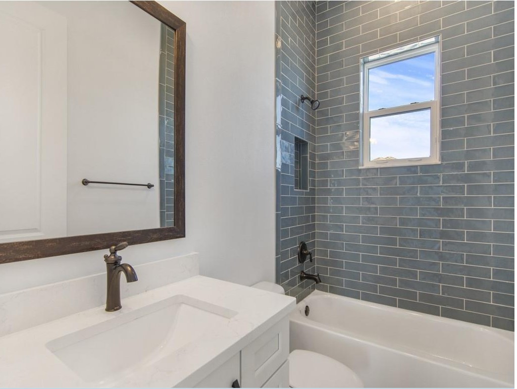 5865 Palmetto Preserve Road Vero Beach, FL 32967 - Photo 3 of 7 a bathroom with a sink and a bathtub