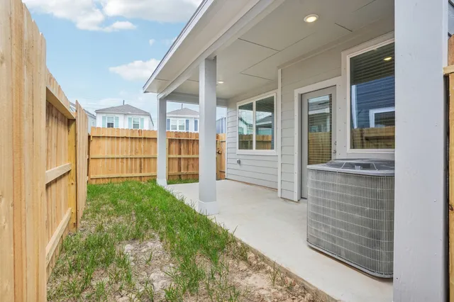 a view of a backyard of the house