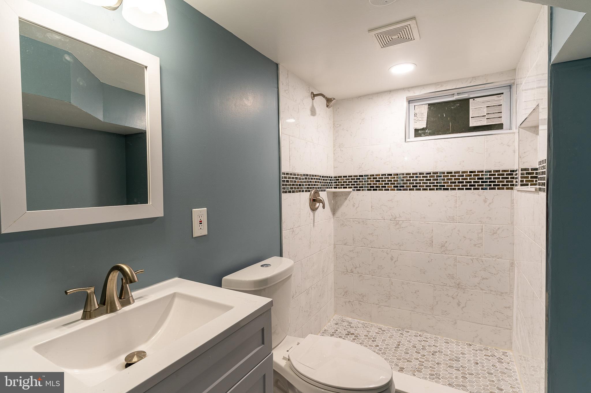 407 Old Riverside Road Baltimore, MD 21225 - Photo 16 of 27 Modern bathroom with elegant finishes.