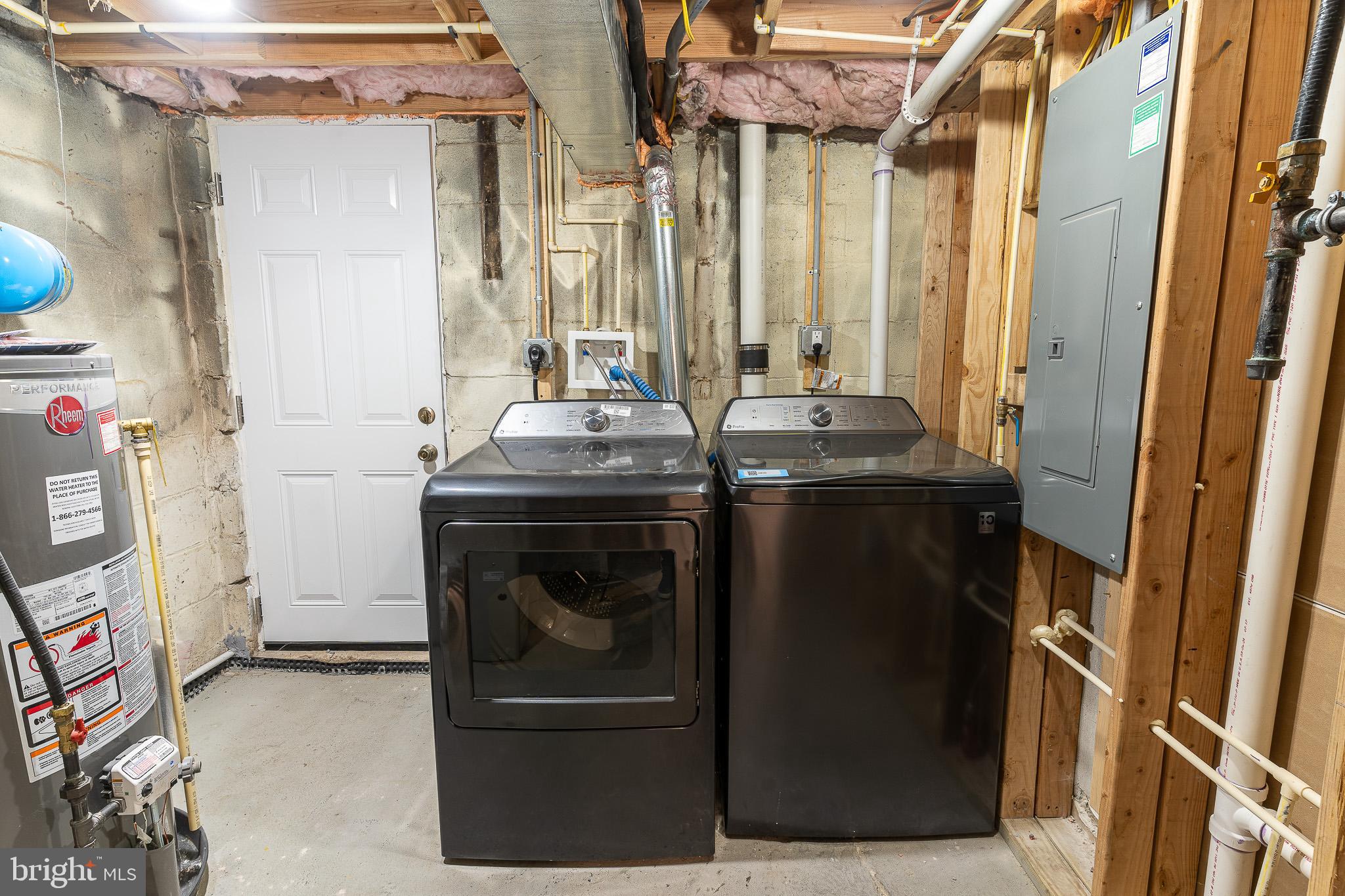 407 Old Riverside Road Baltimore, MD 21225 - Photo 17 of 27 Modern laundry space with sleek appliances.