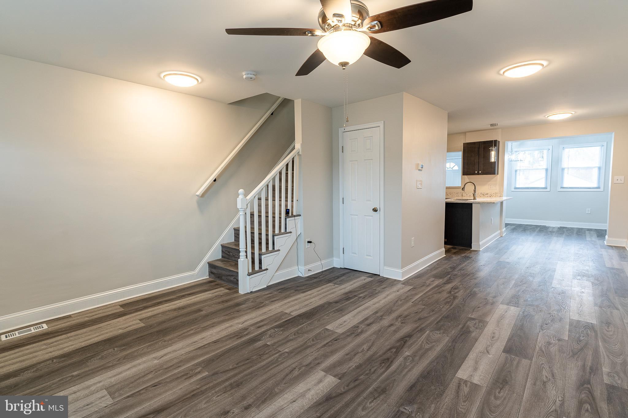 407 Old Riverside Road Baltimore, MD 21225 - Photo 2 of 27 Spacious, modern living area with natural light.