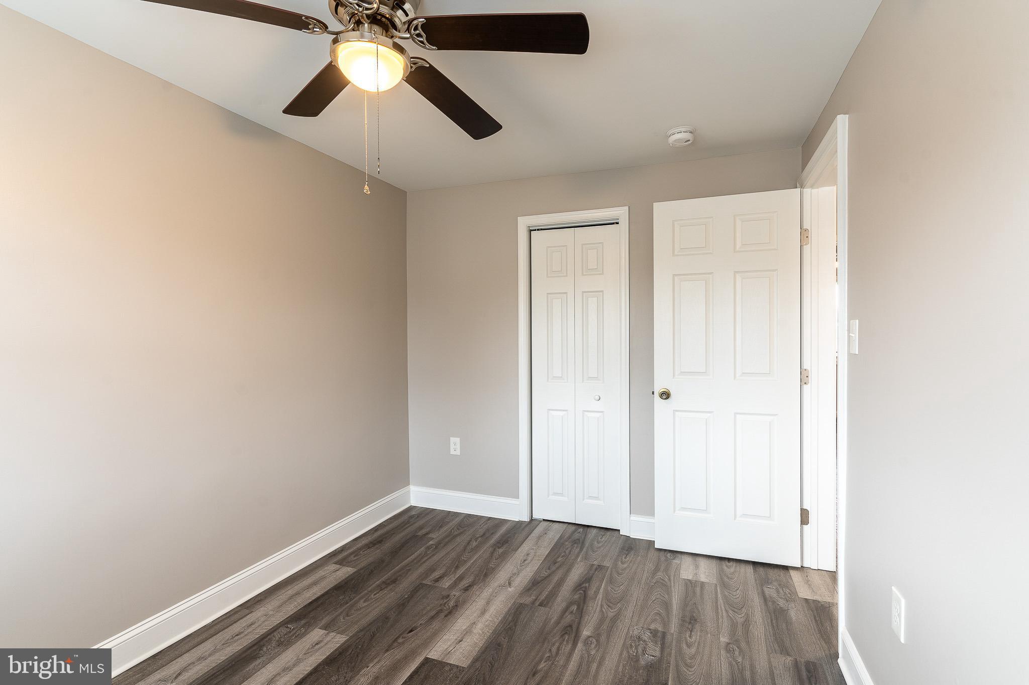 407 Old Riverside Road Baltimore, MD 21225 - Photo 25 of 27 Bright and airy room with modern finishes.