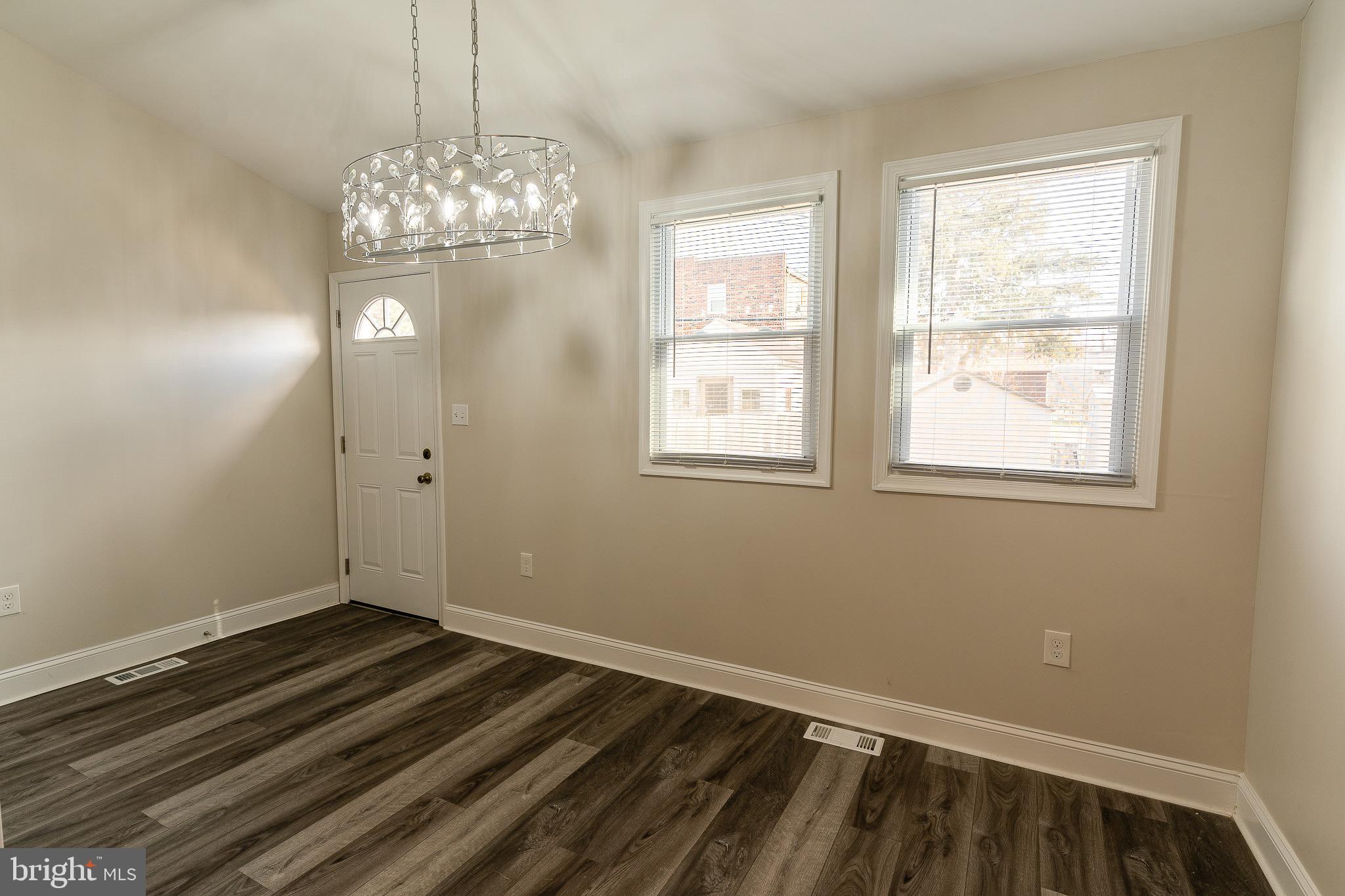 407 Old Riverside Road Baltimore, MD 21225 - Photo 6 of 27 Bright and airy space with modern charm.
