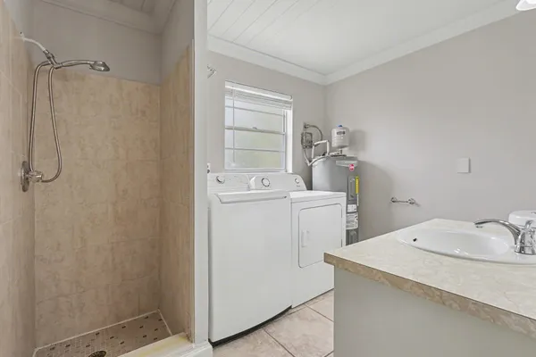 a bathroom with a sink a toilet and a bathtub