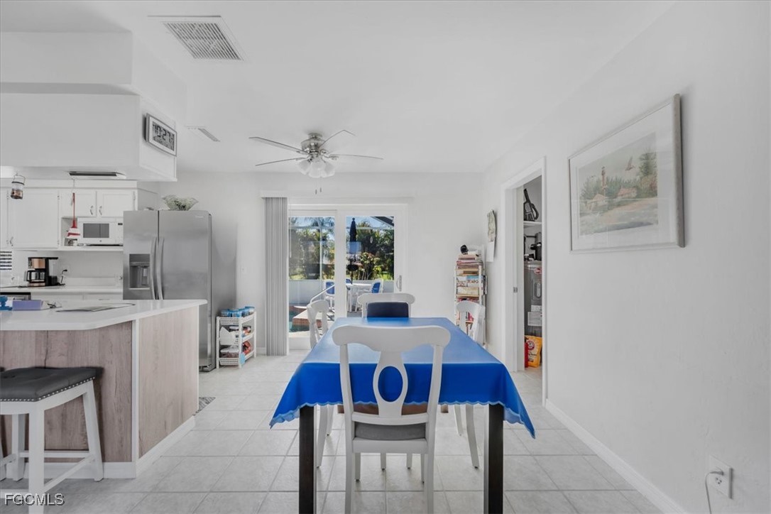 13239 Caribbean Boulevard Fort Myers, FL 33905 - Photo 15 of 37 a living room with furniture and wooden floor