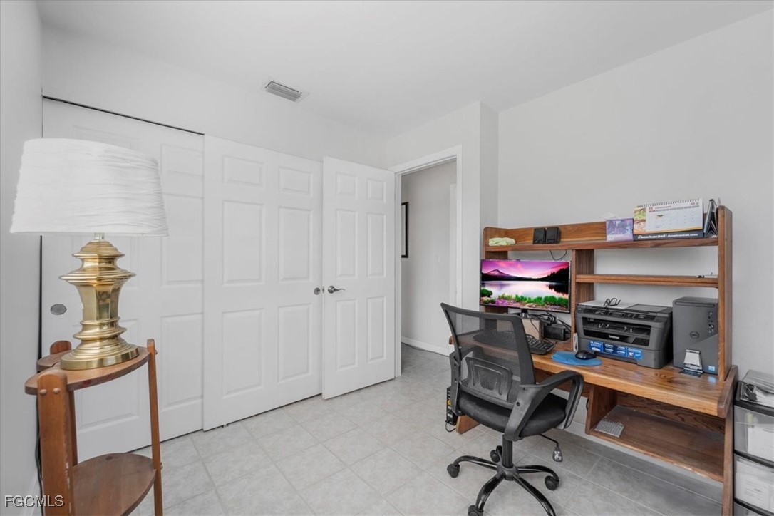 13239 Caribbean Boulevard Fort Myers, FL 33905 - Photo 23 of 37 a view of a workspace with furniture