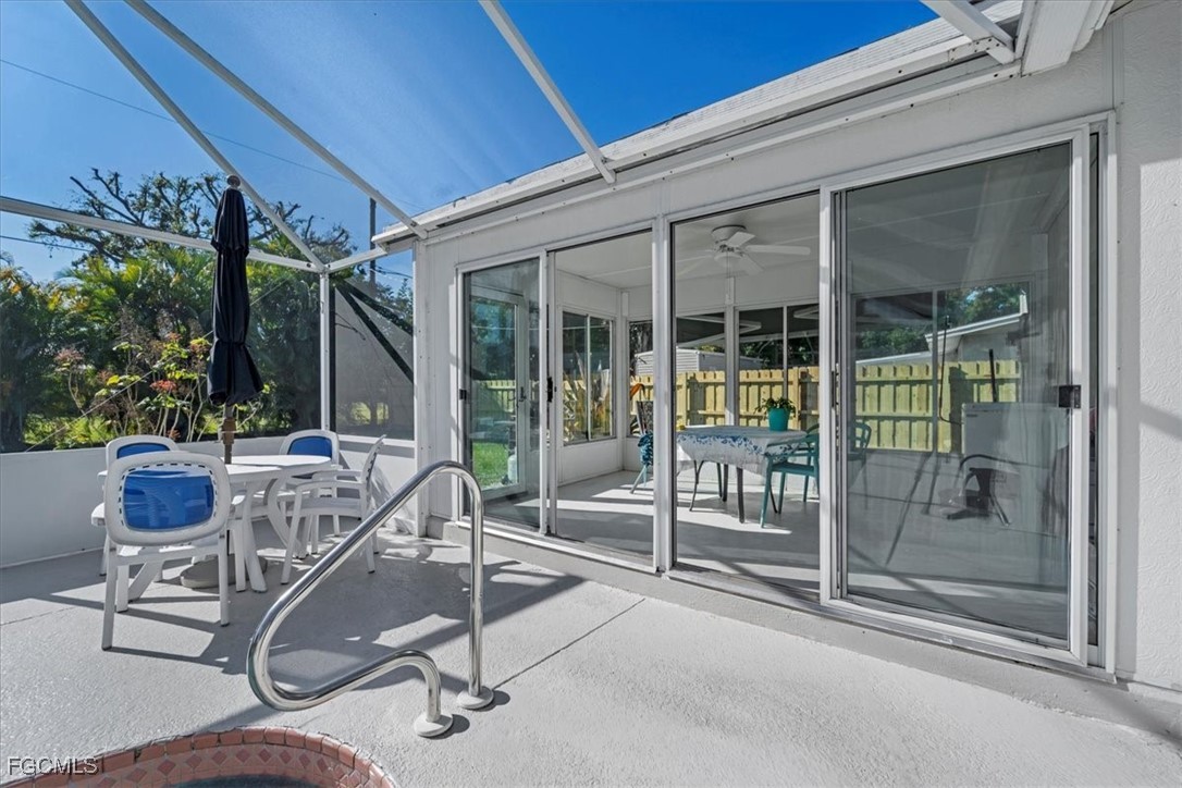 13239 Caribbean Boulevard Fort Myers, FL 33905 - Photo 25 of 37 a balcony with table and chairs
