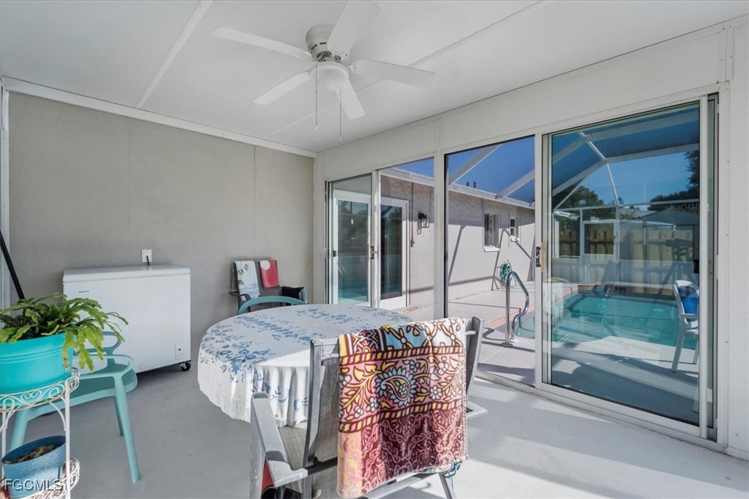 13239 Caribbean Boulevard Fort Myers, FL 33905 - Photo 26 of 37 a bedroom with furniture and a window