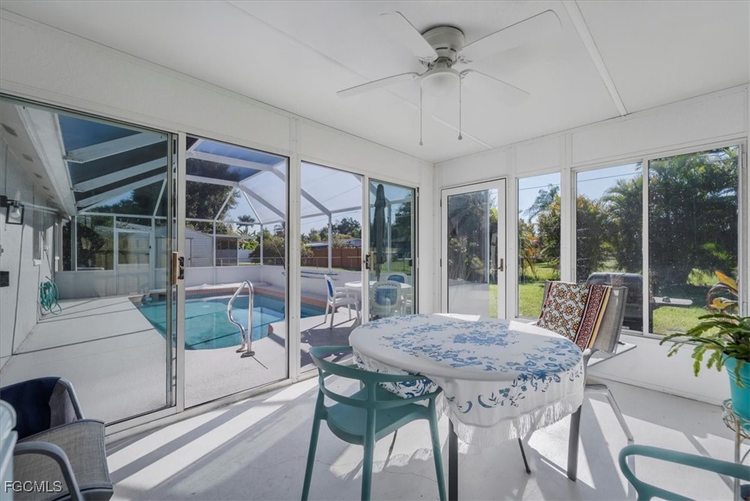 13239 Caribbean Boulevard Fort Myers, FL 33905 - Photo 27 of 37 a view of a patio with a table and chairs