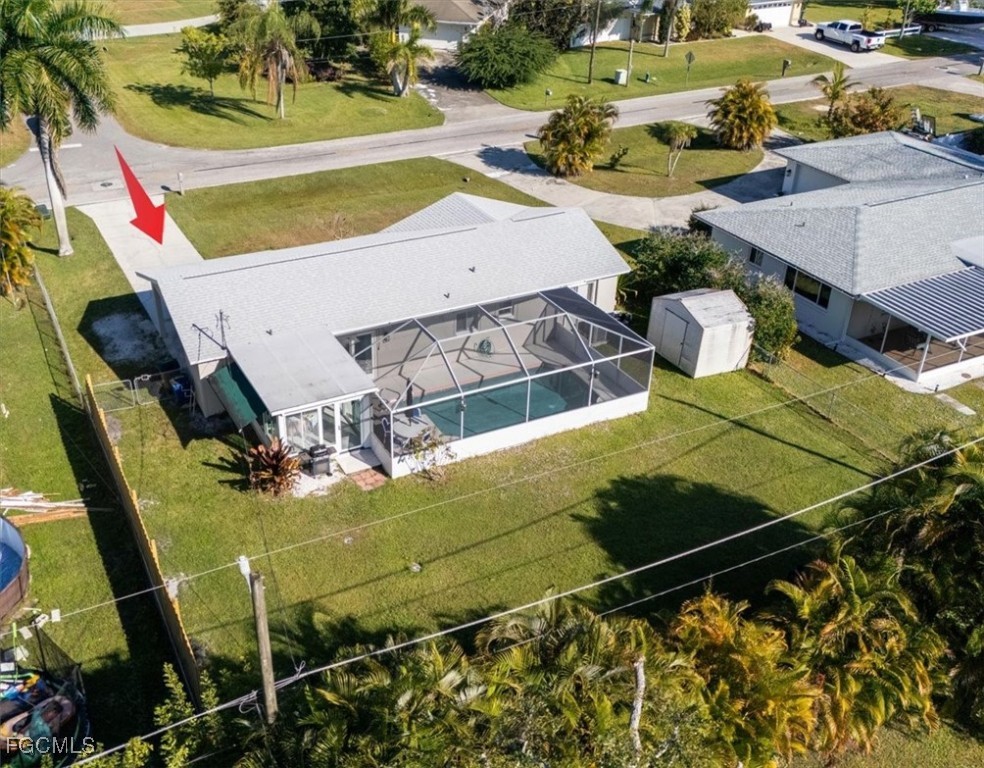 13239 Caribbean Boulevard Fort Myers, FL 33905 - Photo 32 of 37 an aerial view of a pool patio swimming pool and outdoor seating