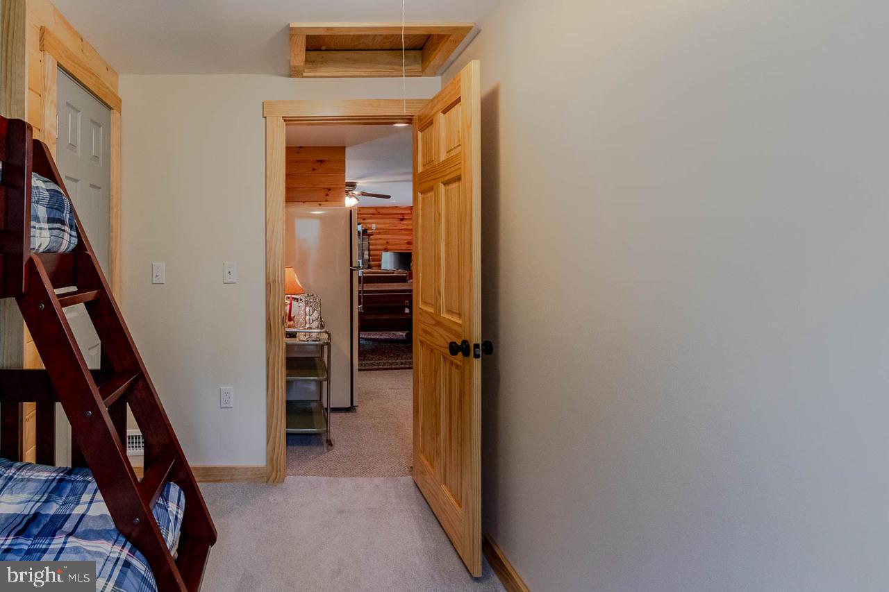 556 Treaster Kettle Road Centre Hall, PA 16828 - Photo 28 of 32 a view of a hallway with wooden floor and entryway