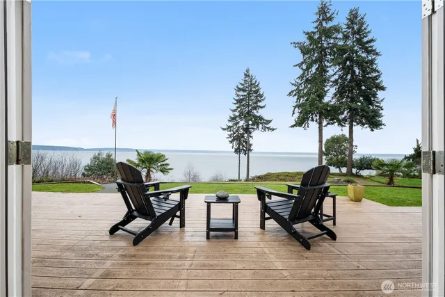 a view of a park with chairs