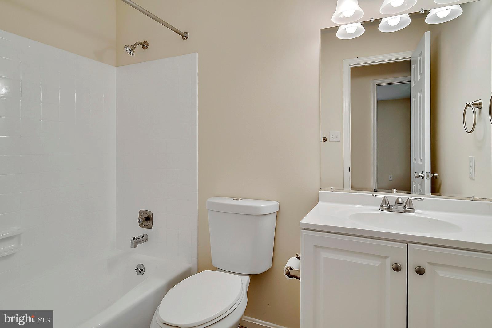 5466 Sumerduck Road Sumerduck, VA 22742 - Photo 14 of 29 a bathroom with a sink a toilet and shower