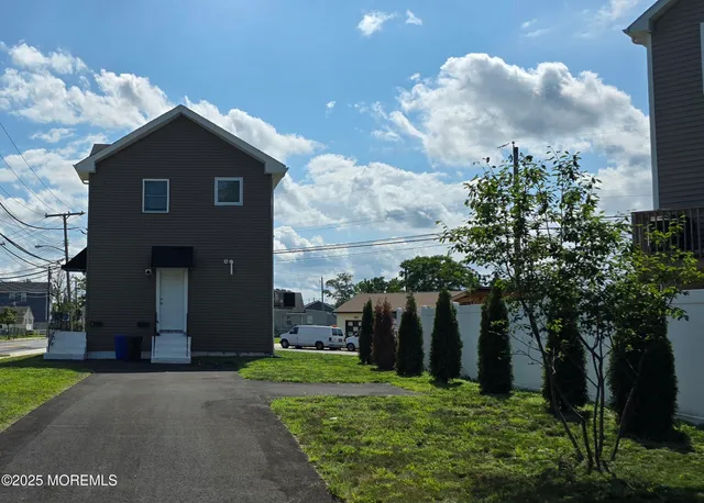a house view with a garden space