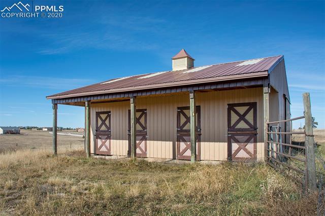 17879 Pinon Park Road Peyton, CO 80831 - Photo 4 of 26 4 stall horse barn.