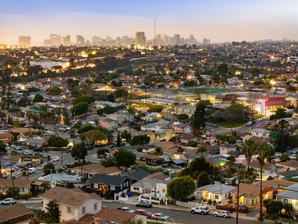 an aerial view of a city with lots of residential buildings