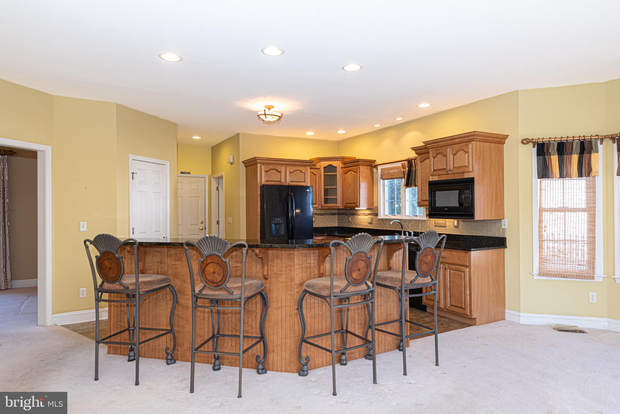 6023 Tarry Town Road Salisbury, MD 21801 - Photo 12 of 61 Inviting kitchen with warm, rich tones.