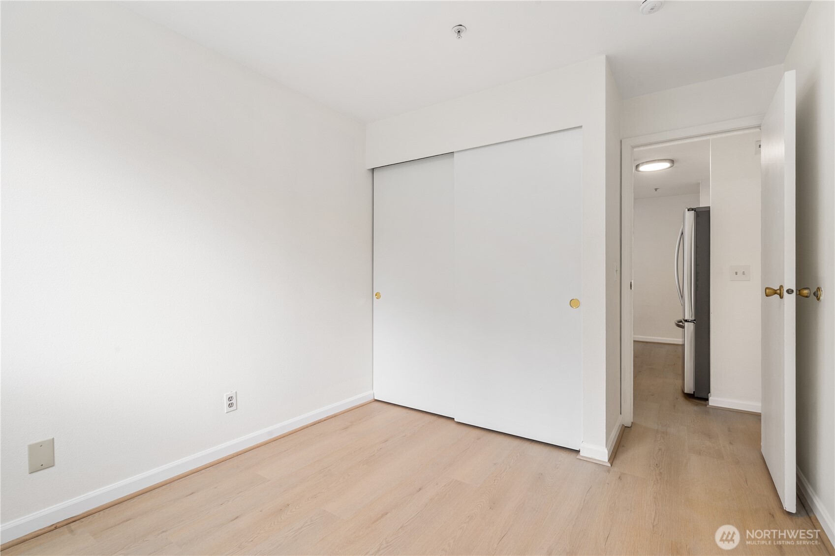 769 Hayes Street, Unit 405 Seattle, WA 98109 - Photo 17 of 29 an empty room with a bathroom