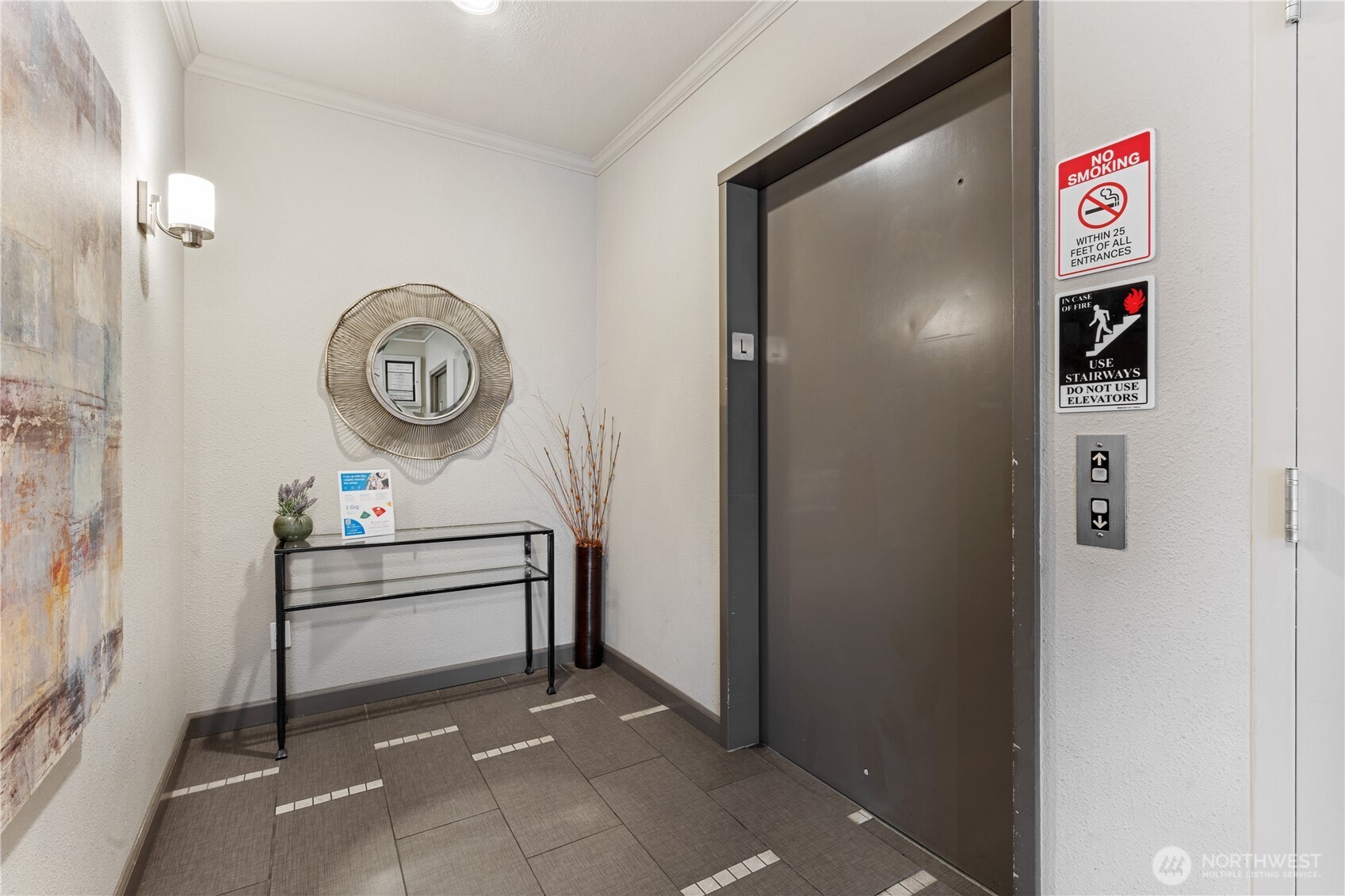 769 Hayes Street, Unit 405 Seattle, WA 98109 - Photo 21 of 29 a view of a hallway with elevator