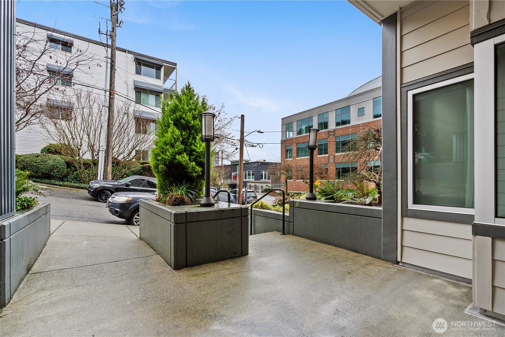 769 Hayes Street, Unit 405 Seattle, WA 98109 - Photo 24 of 29 a living room with furniture and potted plants