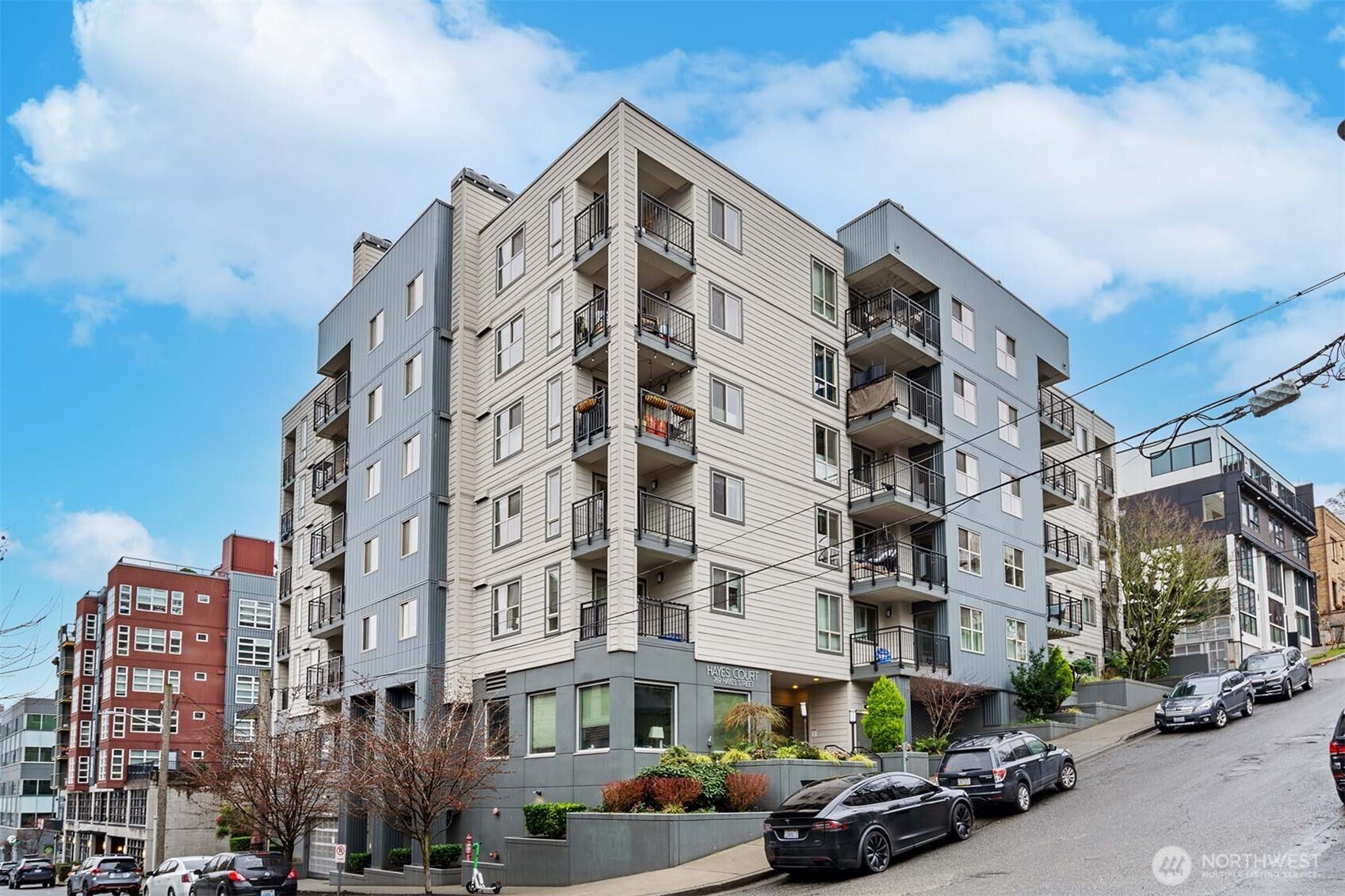 769 Hayes Street, Unit 405 Seattle, WA 98109 - Photo 29 of 29 a front view of a building with street