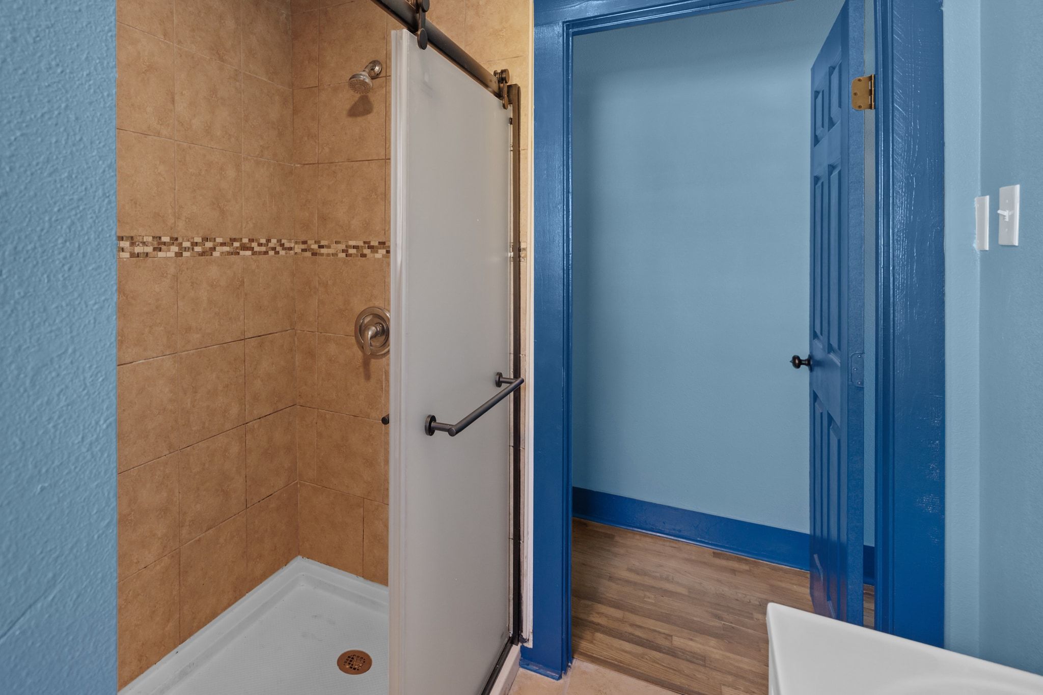 1181 Graham Street Austin, TX 78702 - Photo 14 of 27 a bathroom with a shower and a sink