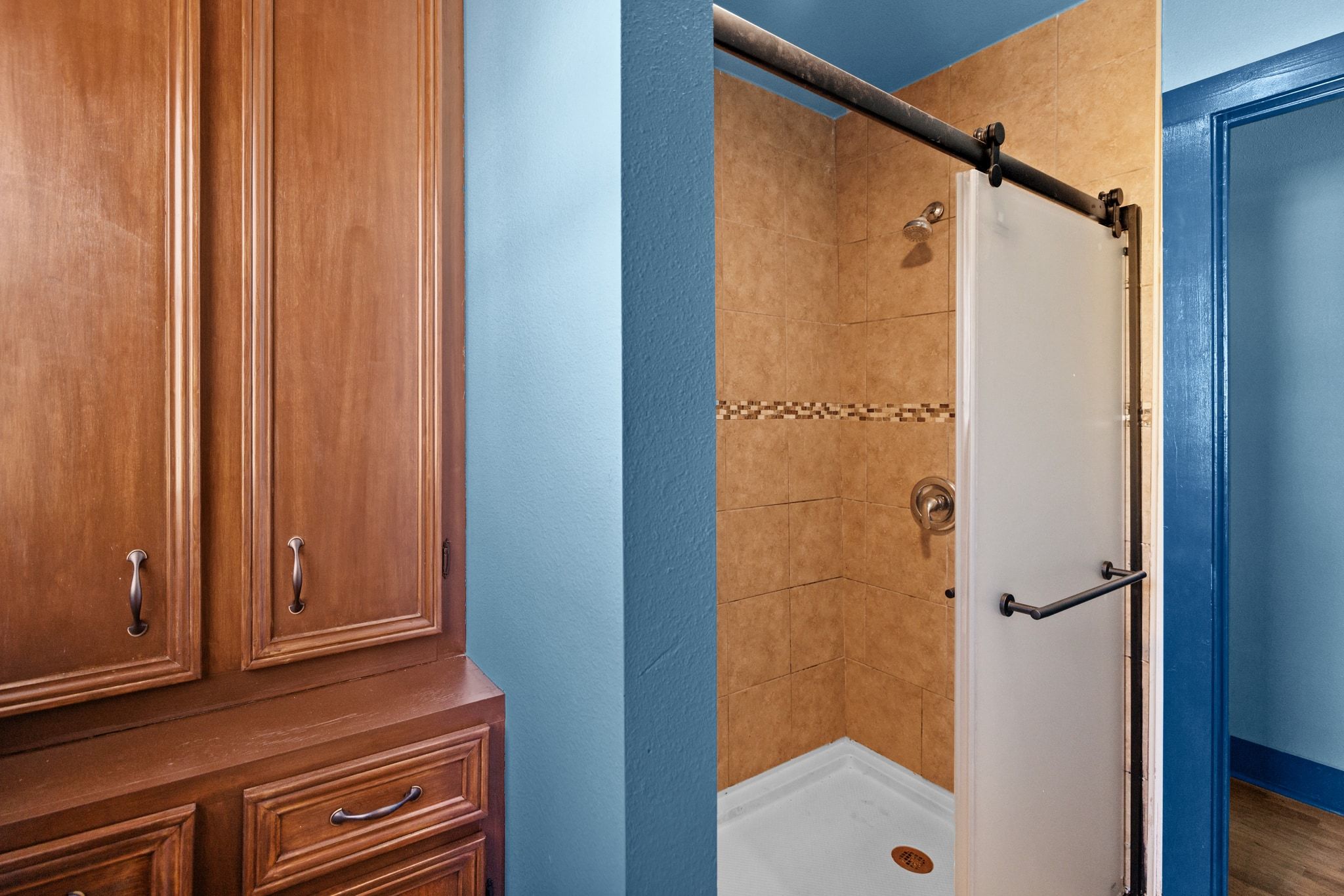 1181 Graham Street Austin, TX 78702 - Photo 15 of 27 a bathroom with a shower and a sink