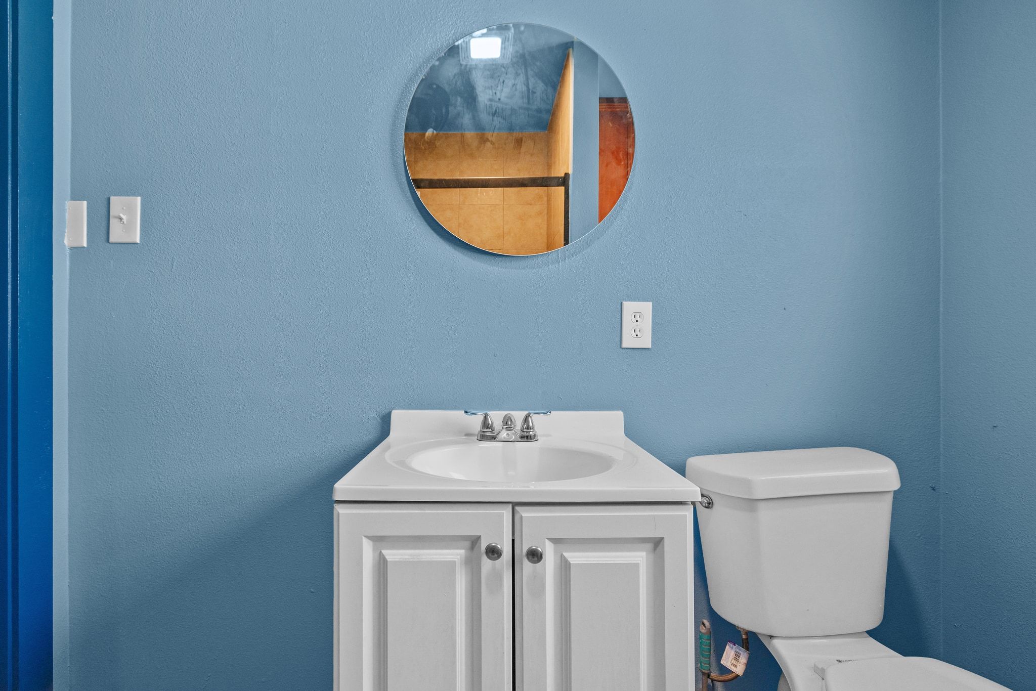 1181 Graham Street Austin, TX 78702 - Photo 16 of 27 a bathroom with a toilet and a sink