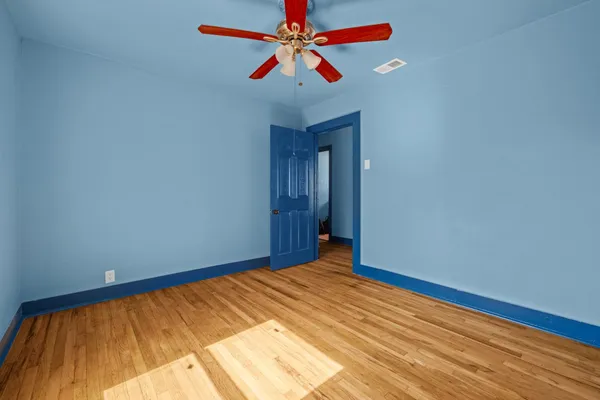 a view of a room with a flat screen tv