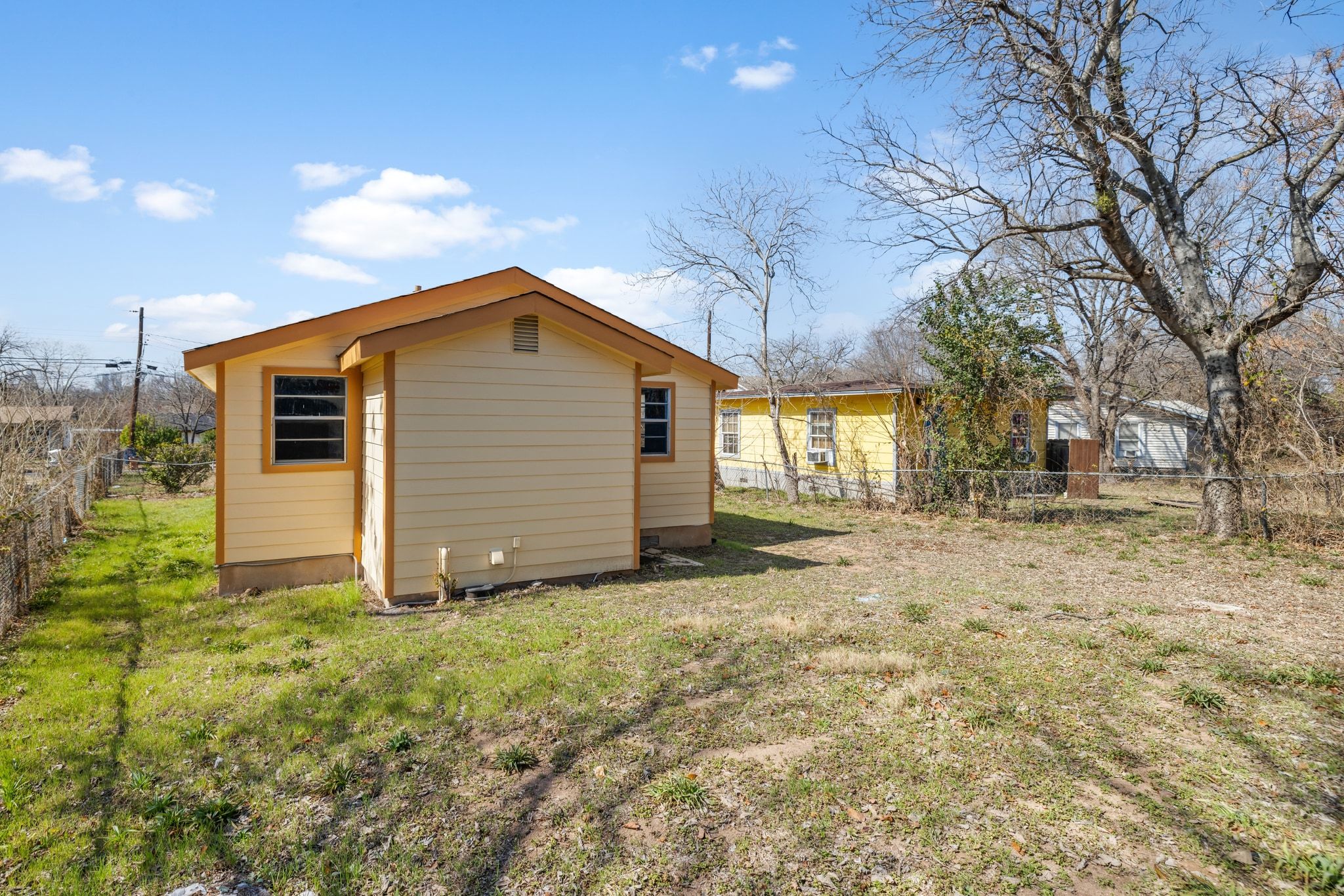 1181 Graham Street Austin, TX 78702 - Photo 24 of 27 a front view of a house with a yard