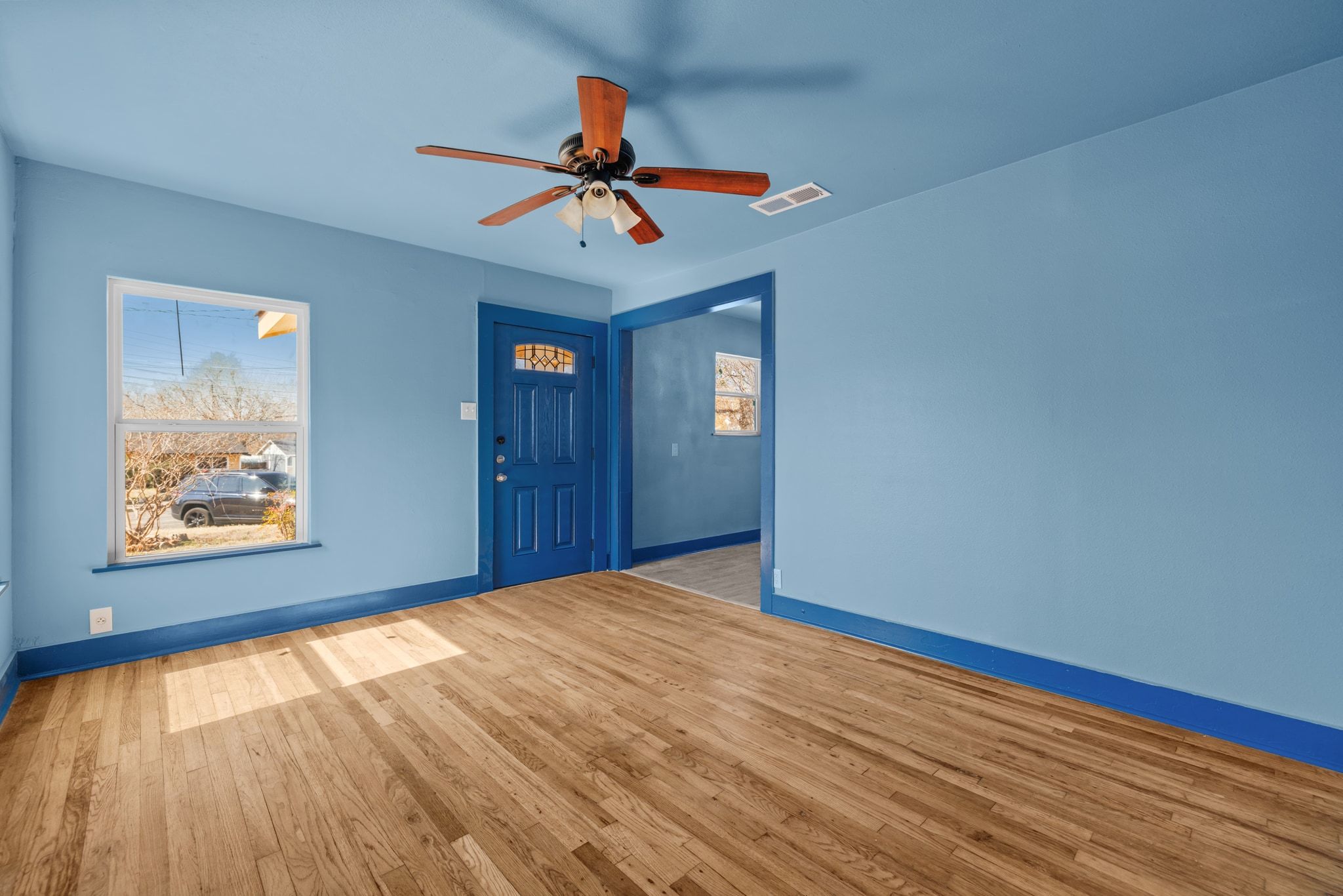 1181 Graham Street Austin, TX 78702 - Photo 6 of 27 a view of an empty room with a window