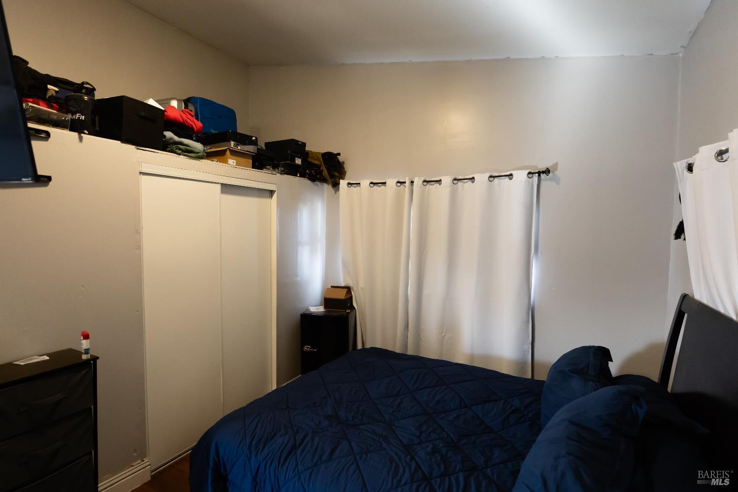 1500 Harrison Street Fairfield, CA 94533 - Photo 6 of 24 a bedroom with a bed and a closet
